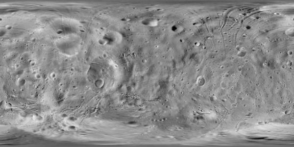 Gray terrain covered by craters and grooves.
