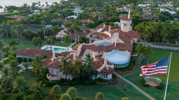 FILE - An aerial view of President Do<em></em>nald Trump&#39;s Mar-a-Lago estate is seen near dusk on Aug. 10, 2022, in Palm Beach, Fla. newly unsealed FBI docu<em></em>ment a<em></em>bout the investigation at Mar-a-Lago not o<em></em>nly offers new details a<em></em>bout the probe but also reveals clues a<em></em>bout the arguments his legal team intends to make. The May 25 letter from one of his lawyers attached as an exhibit to the affidavit advances a broad view of executive power, asserting that the commander-in-chief has absolute authority to declassify whatever he wants and that the primary law governing the handling of classified information applies to other government officials but not the president. (AP Photo/Steve Helber, File)