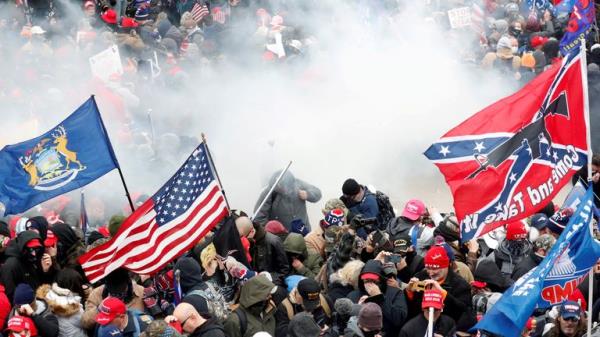 Tear gas is released into a crowd of protesters during clashes with Capitol police at a rally to co<em></em>ntest the certification of the 2020 U.S. presidential election results by the U.S. Congress, at the U.S. Capitol Building in Washington, U.S, January 6, 2021. REUTERS/Shannon Stapleton/File Photo