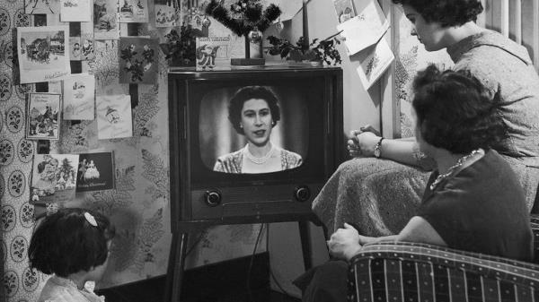 The Smart family from Walthamstow watch the Queen&#39;s Christmas message on television in 1957